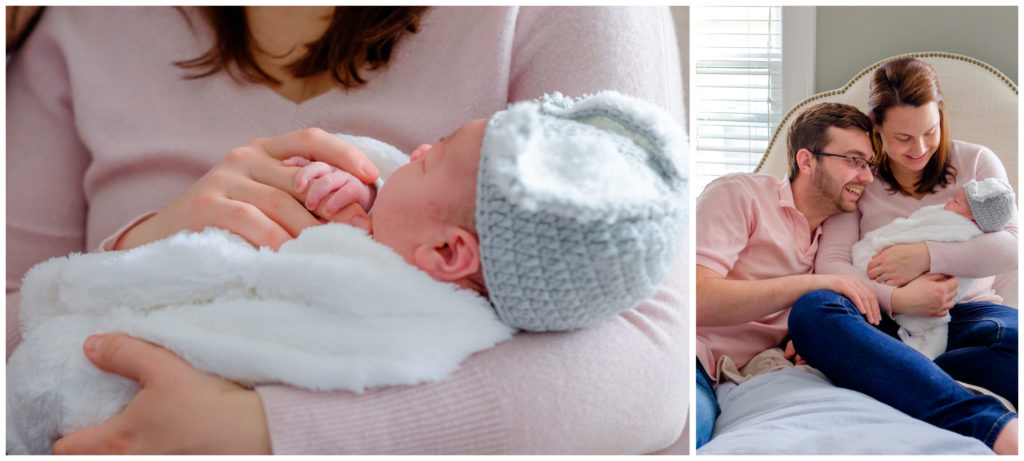 new parents in pink with baby