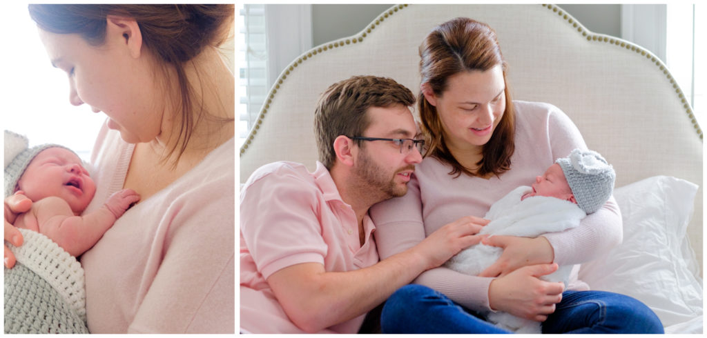 new parents holding their newborn baby in a bunny costume