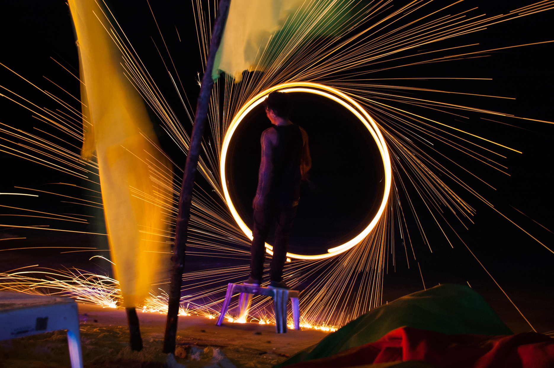 Fire spinner on the beach in Ko Phi Phi, Thailand