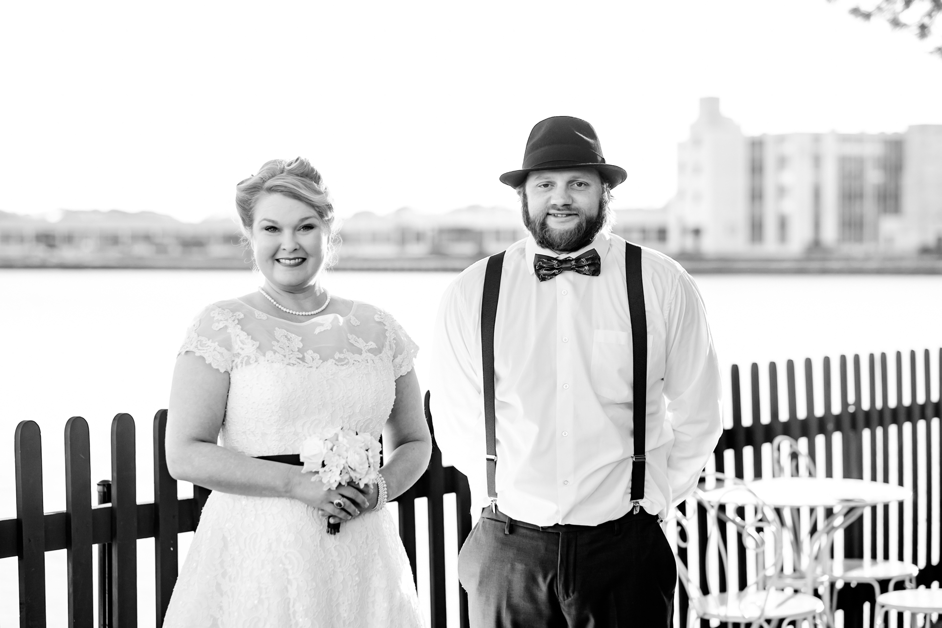 Bride and groom get married in the historic house of the seven gables in salem massachusetts. This elopement has a classic pin up style with a tea length dress, red and black accents, a bow tie, a fedora, and gorgeous curls in her hair. This North Shore elopement was an intimate wedding and it was an honor to be the photographer for this couple.