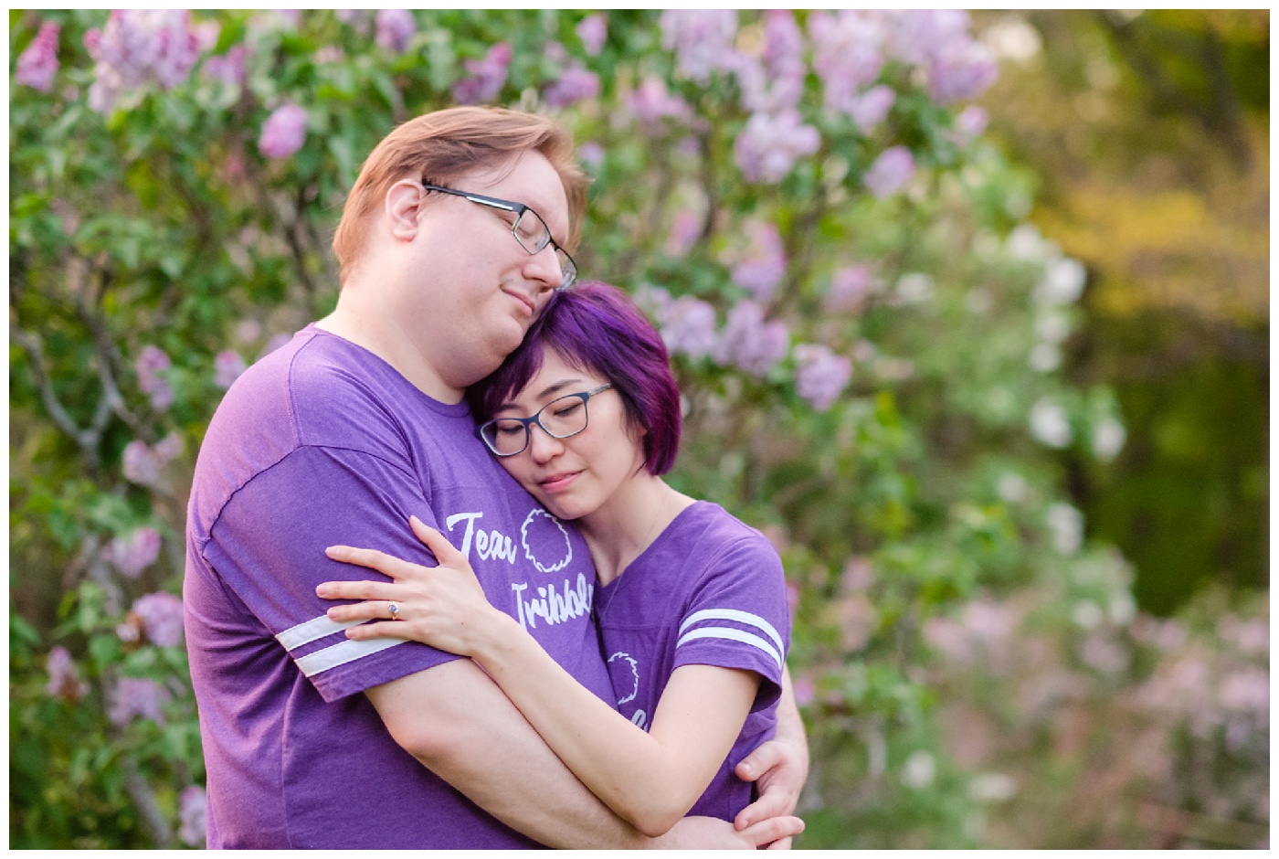 arnold arboretum,couple,engagement,flowers,green,lilacs,nature,park,portraits,purple,romantic,silly,spring,tiffany & rob,