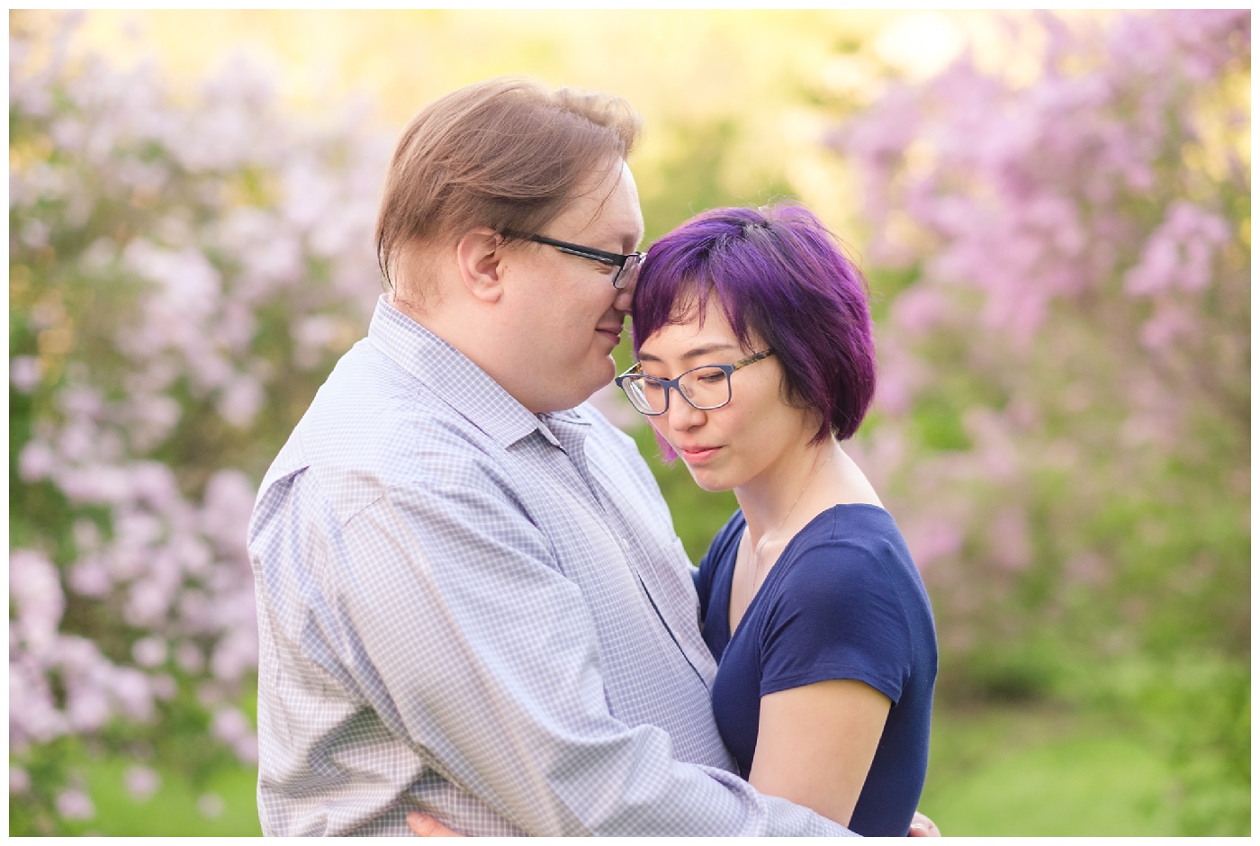 arnold arboretum,couple,engagement,flowers,green,lilacs,nature,park,portraits,purple,romantic,silly,spring,tiffany & rob,