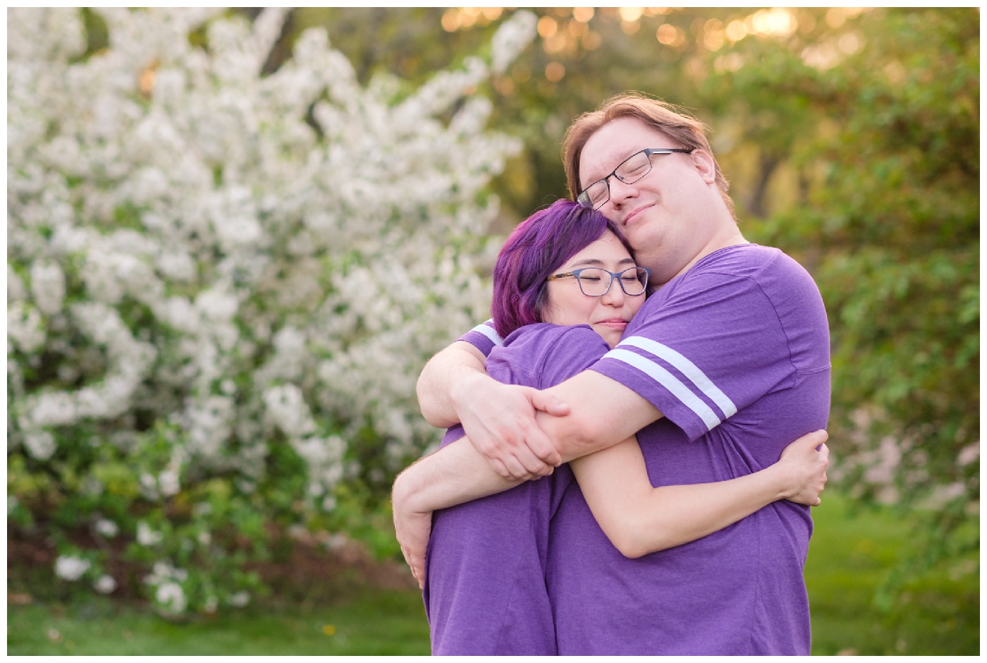 arnold arboretum,couple,engagement,flowers,green,lilacs,nature,park,portraits,purple,romantic,silly,spring,tiffany & rob,