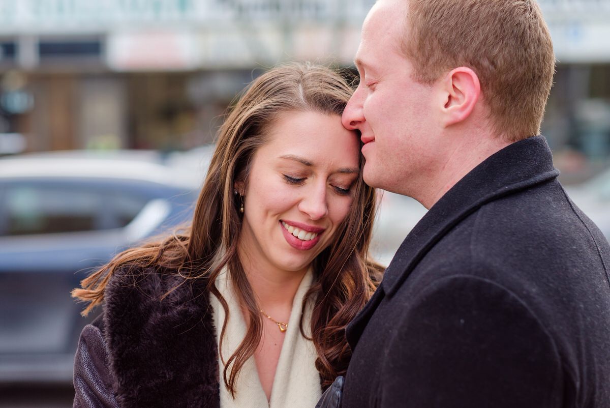 Engaged couple at Bow Market in Union Square