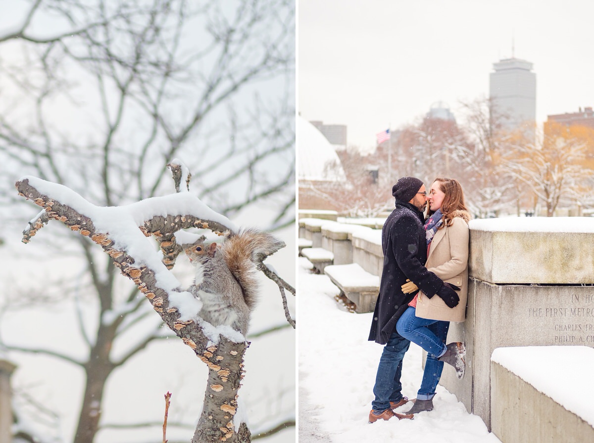 Engaged couple embraces in front of the Boston skyline on the Charles River Esplanade.