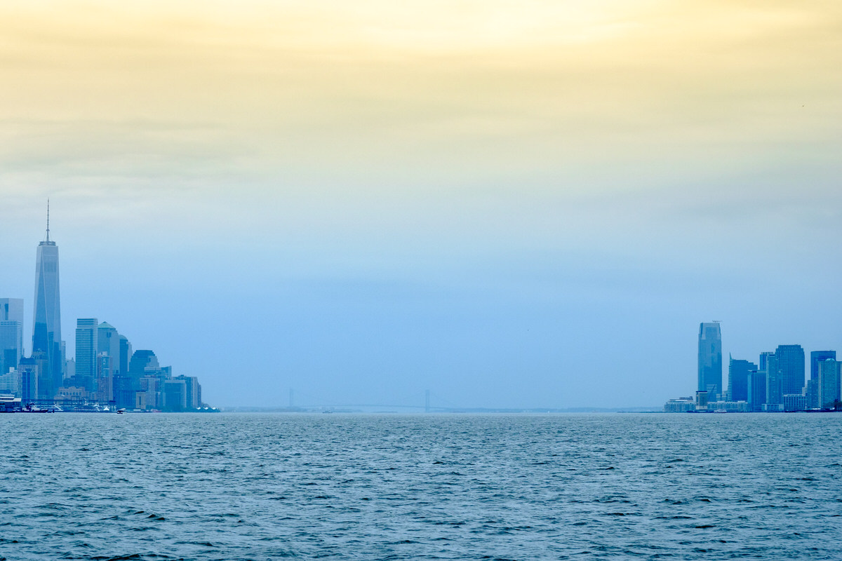 Blue and yellow sky over New York and New Jersey harbor