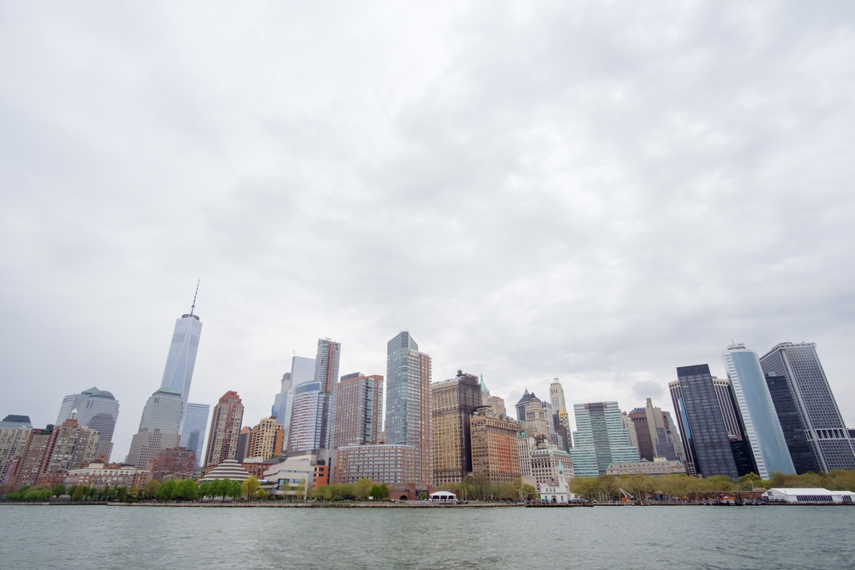 Wide view of Manhattan skyline from the water