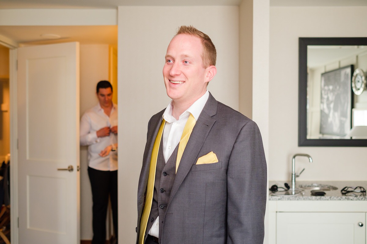 Groom getting ready at the Charles Hotel in Cambridge, MA