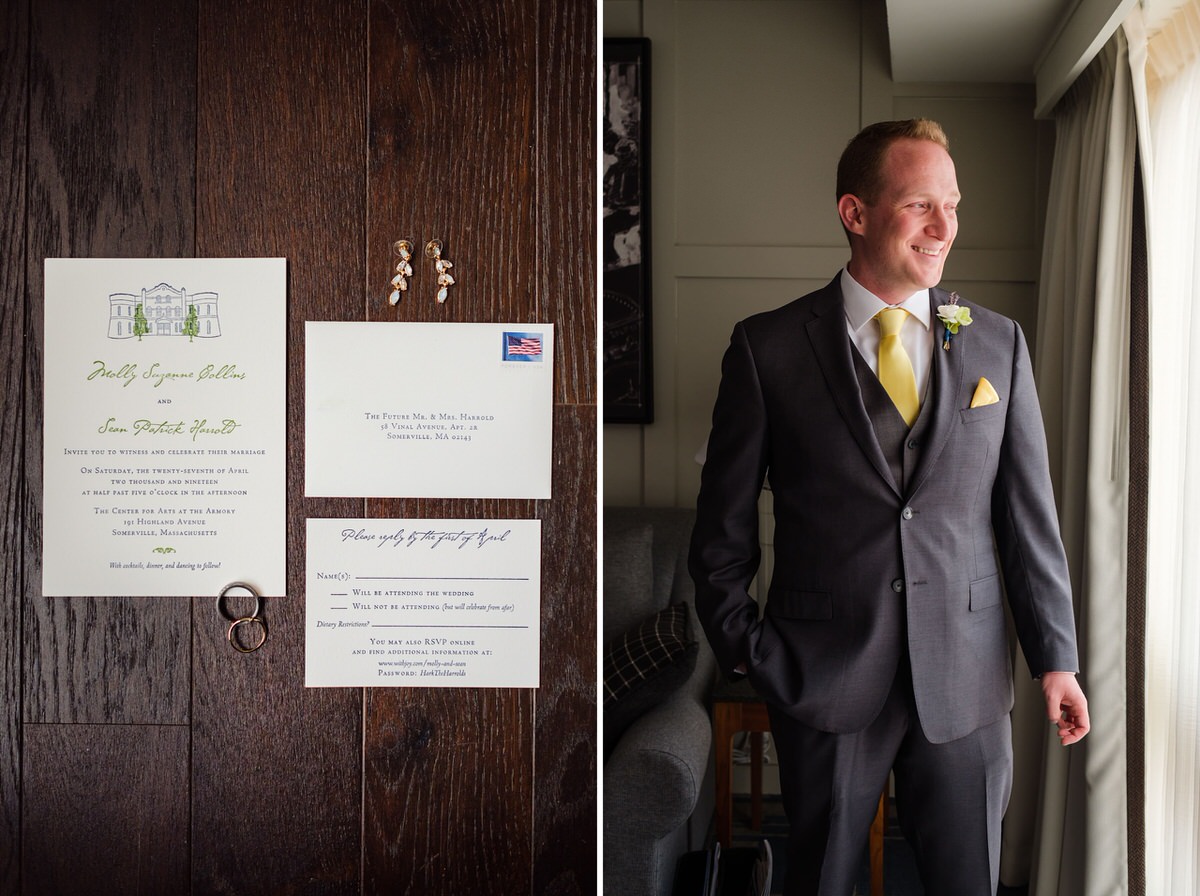 Groom looks out the window of the Charles Hotel next to a wedding invitation suite