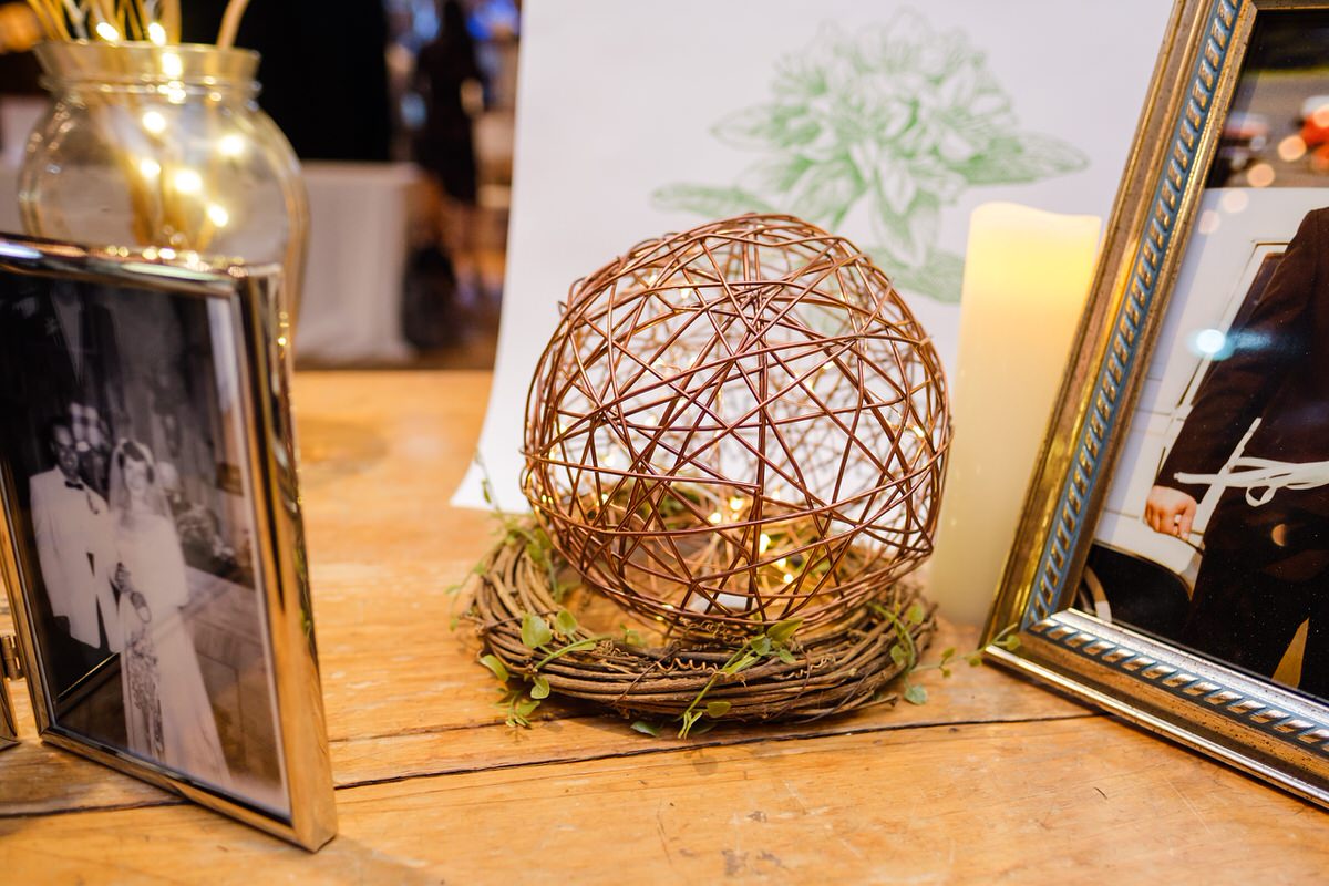 Wicker ball on wedding welcome table