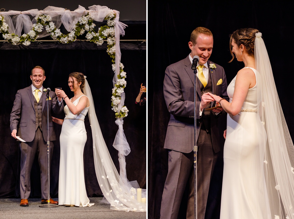 Bride and groom raise a glass and he puts a ring on her finger