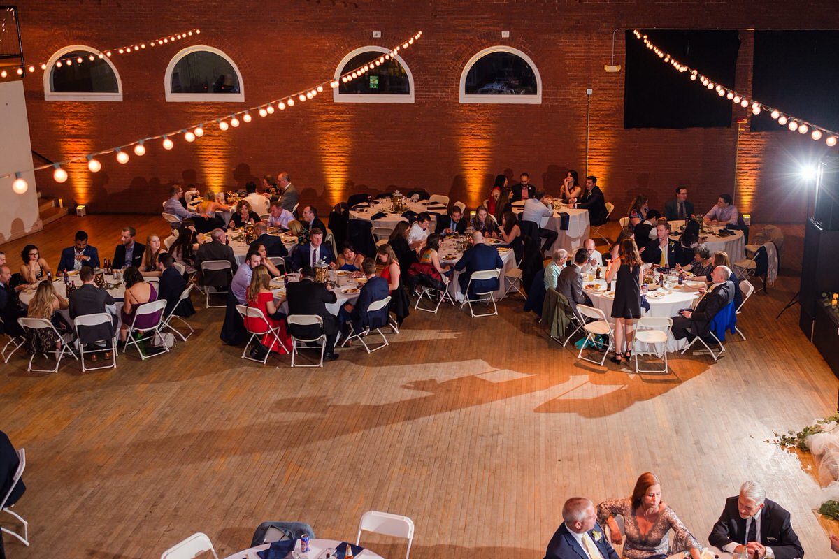 Wide view of wedding reception at Somerville Armory