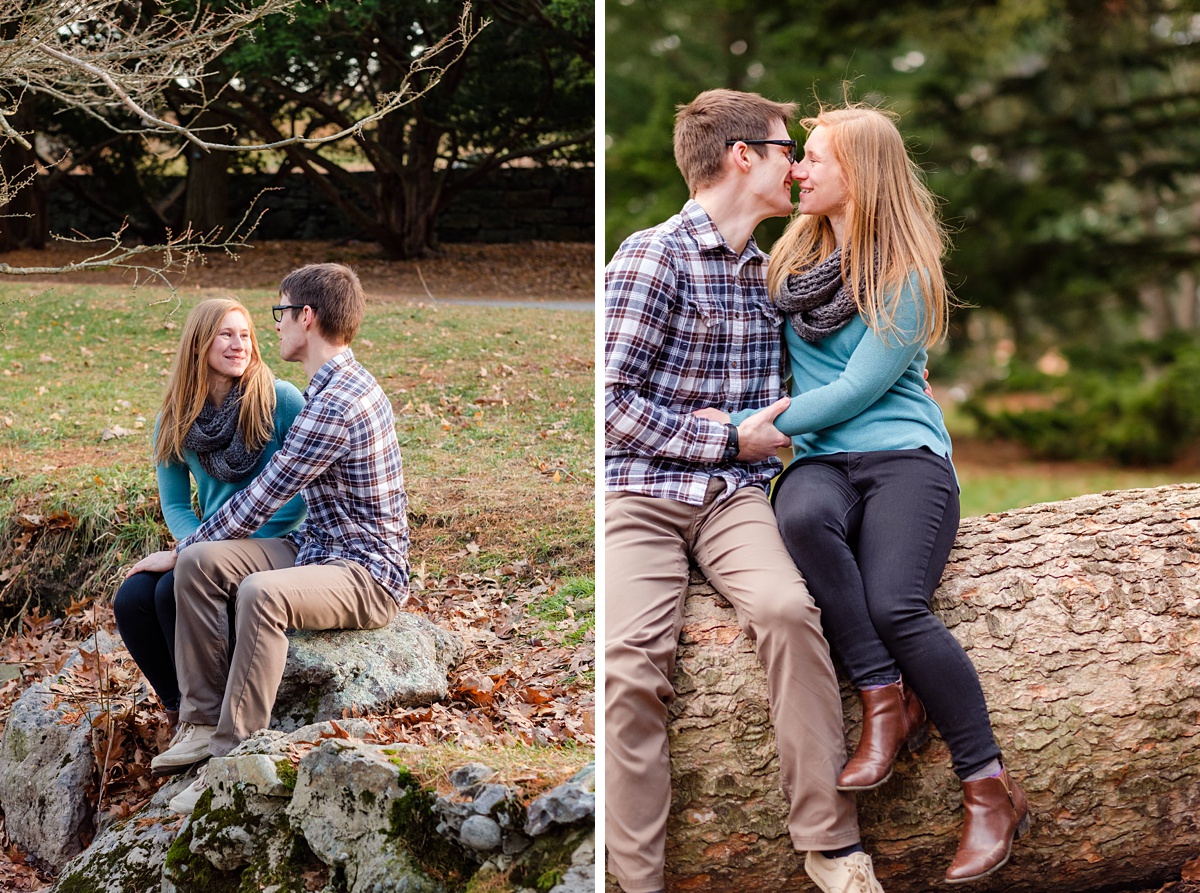 Engagement photos of a couple sitting by a river in Boston