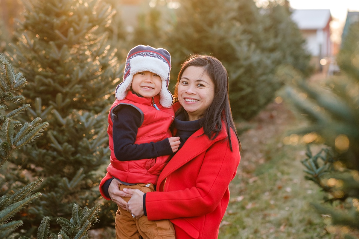 North Shore Christmas tree farm photo of mother and son in red coats